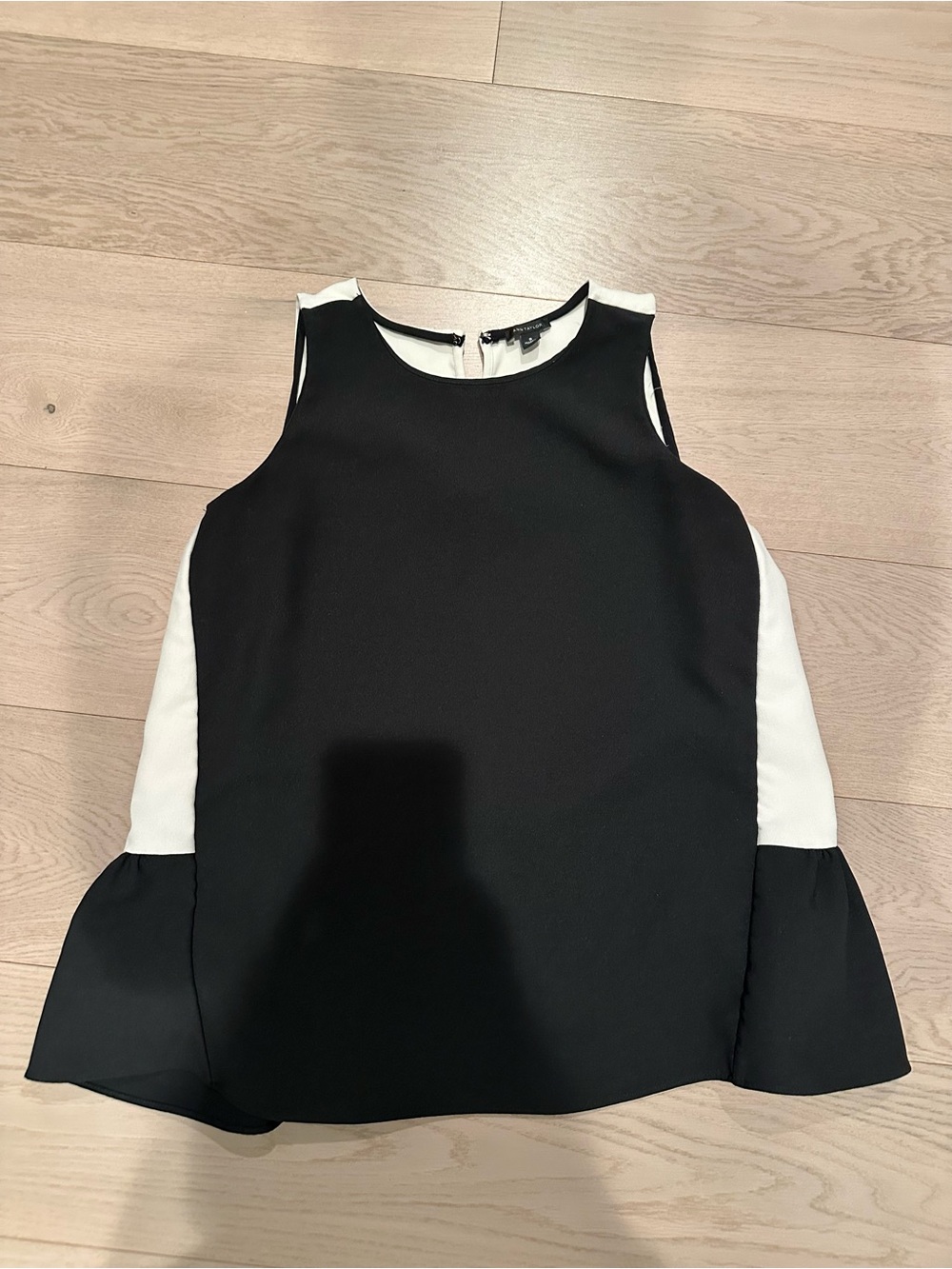 Ann Taylor Black with White Side Panels Sleeveless Ruffle-Hem Top
